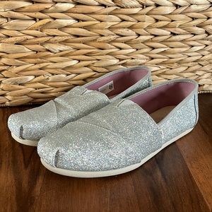 Size 9.5 silver sparkle Toms. Only worn a a hand full of times.